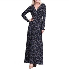 95% Polyester, 5% Spandex. So Soft It Feels Like Pajamas! Gorgeous 4 Button Detail Along Left Neckline. Black Background With Pink And Blue Flowers. Rn#153801 Black Stretch Dresses With Buttons, Black Long Sleeve Maxi Dress With Buttons, Floral Print Stretch Maxi Dress For Night Out, Black Fitted Maxi Dress With Buttons, Fitted Black Maxi Dress With Buttons, Fitted Long Sleeve Maxi Dress With Buttons, Long Fitted Maxi Dress With Buttons, Fitted Long Maxi Dress With Buttons, Long Sleeve Maxi Dress Black