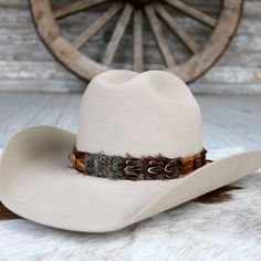 The Shikoba (short) is a smaller version of our best selling hat band. Specially designed for small sized hats (6 7/8 and under) and kids hats.  Length: approx. 53cm (not including leather ties) * Width: 2cm Cheap Brown Western Hat Bands, Feather Hat Band, Combat Boots Heels, Felt Cowboy Hats, Kids Belt, Beaded Hat, Feather Hat, Boot Jewelry, Leather Hats