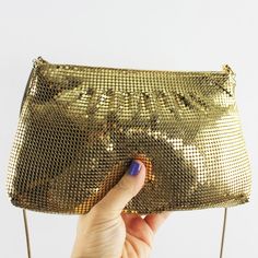 Gold Chainmail Disco Bag with Gold Metal Rope Strap Vintage Condition: This handbag is vintage and shows some wear. The gold finish on the leather at the opening is pealing off as seen in the 7th image. There are a few marks on the lining. Please take a close look at all of the images. Dimensions: Width at Top: 7 1/4" (18.4 cm) Width at Bottom: 9 1/2" (24.1 cm) Height: 5 1/2" (14 cm) Strap length: 41" (104.1 cm) 2 Interior pockets: 4" x 2 3/4" (10.2 cm x 7 cm) Feel free to contact me with any questions. For additional handbags visit either of my etsy shops: http://MeganLeoneVintage.etsy.com http://MeganLeone.etsy.com Vintage Gold Shoulder Bag For Party, Vintage Gold Shoulder Bag With Gold-tone Hardware, Retro Gold Rectangular Shoulder Bag, Vintage Gold Shoulder Bag For Formal Occasions, Gold Retro Bags, Gold Everyday Bag With Gold Clasp, Gold Retro Shoulder Bag For Evening, Everyday Gold Bag With Gold Clasp, Gold Retro Bags With Gold-tone Hardware