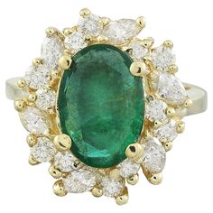 4.67 Carat Natural Emerald 14 Karat Solid Yellow Gold Diamond Ring Stamped: 14K Total Ring Weight: 8.1 Grams Emerald Weight 3.57 Carat (12.00x10.00 Millimeters) Diamond Weight: 1.10 carat (F-G Color, VS2-SI1 Clarity ) Face Measures: 19.15x18.00 Millimeter SKU: [600862]