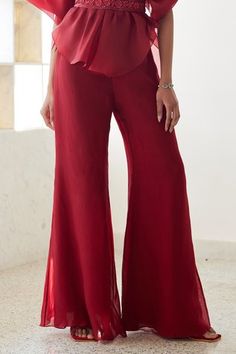 Shop for Mishru Red Iris Dramatic Sheer Pouf Top And Pant Set for Women Online at Aza Fashions Red Silk Evening Bottoms, Red Silk Bottoms For Evening, Chic Red Silk Bottoms, Red Silk Party Bottoms, Elegant Red Bottoms For Wedding, Elegant Red Wedding Bottoms, Elegant Red Ruffled Bottoms, Elegant Red Bottoms With Ruffles, Elegant Red Bottoms For Festive Season