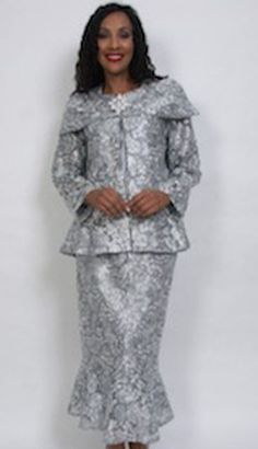 Introducing the HD Couture 5006 Church Suit, a stunning ensemble designed to bring elegance and grace to your formal wear collection. This meticulously crafted suit boasts a refined aesthetic that complements any special occasion, whether it's a church service, a formal gathering, or an elegant social event. The suit features a beautifully tailored jacket and skirt. The jacket's structured design creates a flattering, feminine silhouette, while the intricate lace detailing adds a layer of sophis Evening Sets With Fitted Long Sleeve, Evening Long Sleeve Fitted Set, Fitted Long Sleeve Evening Set, Evening Sets With Notch Lapel For Fall, Elegant Fitted Suits For Spring, Elegant Fitted Long Sleeve Suits, Glamorous Fitted Suits For Party, Elegant Fitted Party Sets, Spring Formal Fitted Sets