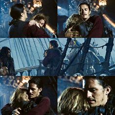 two people hugging each other in front of a boat and another person on the ship