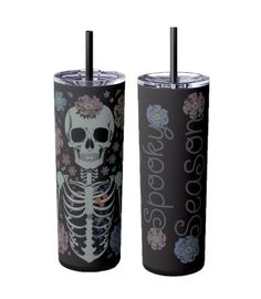 two tumblers with skeletons and flowers on them, one is black and the other is gray