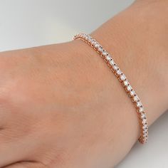 Women's bracelet features round cut lab grown diamonds set in solid 14k yellow gold.  Bracelet measures 7". Flexible Bracelet, Diamond Tennis Necklace, Diamond Tennis Bracelet, Tennis Necklace, Diamond Settings, Broken Chain, Yellow Gold Bracelet, Tennis Bracelet Diamond, Matching Band