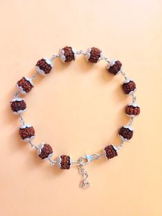 "Giglirigli Gems" Welcomes you "Valuable Rudraksha Bracelet, Gemstone Bracelet, Brown Statement Bracelet, 925 Sterling Silver Jewelry, Anniversary Gift, Bracelet For Wife" Metal : 925 Sterling Silver Pearl Pendants https://www.etsy.com/shop/Giglirigligems?ref=seller-platform-mcnav&search_query=Pearl+pendants Pearl Earrings https://www.etsy.com/shop/Giglirigligems?ref=seller-platform-mcnav&search_query=Pearl+earrings Pearl Ring https://www.etsy.com/shop/Giglirigligems?ref=seller-platform-mcnav&search_query=Pearl+ring A complete hub of Silver/Gold Jewelry & Gemstone Manufacturing Our Ability - 1000 Pieces per week &CAD/CAM Designing,Wire Wrapped Jewelry ,Rhodium Plating ,Micron plating,Grain Setting etc We are any Design as per your Requirement Payment policy We accept the payment via paypal Adjustable Silver Beads Fusion Jewelry, Adjustable Fusion Style Silver Beaded Jewelry, Adjustable Silver Beaded Fusion Bracelet, Adjustable Sterling Silver Beaded Fusion Bracelets, Spiritual 8mm Beads Bracelet Jewelry, Spiritual 8mm Beads Bracelet, 8mm Beads Bracelet For Meditation, Traditional Adjustable Chain Bracelet With Sterling Silver Clasp, Spiritual Bangle With Sterling Silver Clasp