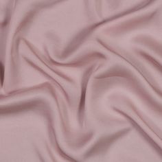 Live la vie en rose in this Dusty Rose Tencel Twill, featuring an ultra-soft hand, billowing drape, and subtle sheen.Suggested Projects:  Pants, Skirts, Shirts, DressesContent:  100% TencelStretch:  NoneOpacity:  TranslucentA pastel dusty rose colorway and an ultra-soft hand take this twill to the next level. Presenting a subtle sheen along its face, transform this woven into day-to-night looks for any season. From wide-leg trousers to shift dresses, it has a billowing drape that flows with ease Stagnant Water, Rose Clothing, Dusty Rose Color, Mood Fabrics, Sleeves Designs For Dresses, Dress Forms, Designs For Dresses, Night Looks, Soft Hand