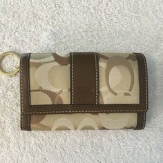 NWT.  Great Wallet.  N Coach Rectangular Trifold Wallet With Coin Pocket, Brown Coach Wallet With Interior Key Chain Holder, Designer Brown Rectangular Wallet, Coach Brown Wallet With Coin Pocket, Brown Coach Wallet With Coin Pocket, Coach Brown Wallet With Card Slots, Beige Rectangular Wallet With Coin Pocket, Coach Brown Rectangular Wallet, Designer Brown Wallet With Coin Pocket