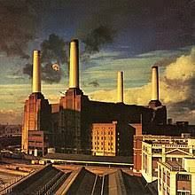 1977, Pink Floyd released their tenth studio album Animals in the US, where it reached No.3 in the charts. The album's cover image, a pig floating between two chimneys on Battersea Power Station, was conceived by bassist Roger Waters and realised by long-time design and photographic collaborators Hipgnosis.  #rockroll #progrock #rockmusic #davidbowie #pinkfloydfans #wishyouwerehere #rollingstones #artist #psychedelic #jimihendrix #pinkfloydthewall #psychedelicrock #blues #pinkfloydfan #jimmypage Pink Floyd Pig, Pink Floyd Artwork, Rock Album Cover, Pink Floyd Album Covers, Storm Thorgerson, Greatest Album Covers, Atom Heart Mother, Pink Floyd Albums, Rock Album Covers