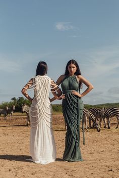 Introducing a stunning two-piece gown set! This unique combination A-line halter dress ties on one shoulder and includes a braided accessory piece that can be worn as a skirt overlay, shoulder shrug, or even separately as a beach pareo. Hours of handwoven braiding create an eye-catching cascade design!100% Cotton. Models are wearing hand-dyed hues Violeta, Emerald, and Nube.Each garment is handmade to order and designed unisize to fit many different body types, as well as individually hand-dyed Bohemian One-shoulder Evening Dress, Bohemian One Shoulder Evening Dress, Sleeveless Pre-draped Summer Gown, Summer Gala Pre-draped Gown, Summer Pre-draped Halter Neck Maxi Dress, Summer Long Pre-draped Evening Dress, Bohemian Draped Maxi Dress For Party, Bohemian Maxi Dress For Summer Gala, Bohemian Floor-length Halter Dress For Party