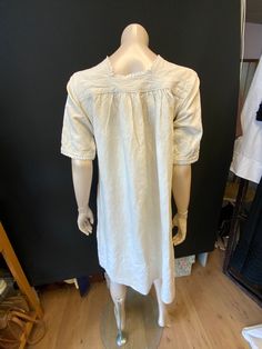 "Antique 1800s French traditional linen hemp nightdress/ smock or shift dress with embroidered monogram in red. Bust size 36/38\" The monogram, JB is nicely worked. The shift has a square neckline edged in picot lace, and has a lace edged front placket that fastens with two small buttons. Gathered onto the yoke both front and back to give fullness. Short lace edged sleeves. The, the fabric is sturdy and durable, but still feels a little coarse, that indicates the lack of use, as hand loomed line Victorian Cotton Prairie Dress, Victorian Cotton Prairie Dress For Daywear, Vintage Linen Daywear Dresses, Fitted Linen Regency Dress, Fitted Linen Regency Style Dress, Regency Style Fitted Linen Dress, Vintage Linen Dresses For Daywear, Cotton Prairie Dress With Short Sleeves, Cotton Unlined Dress For Daywear