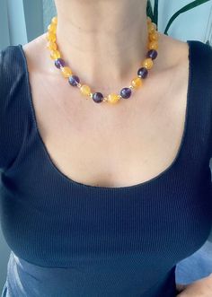 Unique Big Bold Yellow and Purple Choker Necklace, Chunky Gemstone Beaded Jewelry for Women,Mix Crystal Quartz Jewelry for Women ☀️Dimension: 42 cm +4 cm extention chain If you do not want an extension chain or need additional extension chain, please inform me. 🌈Materials:Quartz,14k gold plated 🔴 30% Discount for 2 items use the code: 2ITEMS30 🔴 35% Discount for 3 or more items use the code: MOREITEM35 Visit my shop for all designs: https://www.etsy.com/shop/MervuHandmadeJewelry ✈️Trackable S Citrine Gemstone Beads For Jewelry Making, Spiritual Yellow Jewelry With Gemstone Beads, Yellow Spiritual Jewelry With Gemstone Beads, Yellow Spiritual Beaded Necklace With Gemstone Beads, Spiritual Yellow Gemstone Beads Jewelry, Amber Single Strand Beaded Round Necklace, Yellow Crystal Necklaces For Gift, Amber Single Strand Beaded Necklace, Yellow Necklaces With Natural Stones And Round Beads