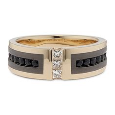 a wedding ring with black and white diamonds on the side, set in 18k yellow gold