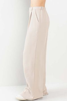 Enhance your wardrobe with our Nude Wide Leg Pants. Made with a flattering wide leg design and convenient pockets, these pants offer both style and functionality. Perfect for any occasion, these pants are a must-have for any fashion-forward individual. Elevate your look and stay on trend with these versatile and comfortable pants. Fabric & fit: 100% polyester Model is wearing size Small. Comfortable Pants, Pants Fabric, Pants Large, Leg Design, Elevate Your Look, Leg Pants, Wide Leg Pants, Fashion Forward, Wide Leg