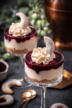 two small desserts with whipped cream and jelly