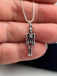 Sterling Silver Skeleton - Small Skelton Necklace, Skull and Bones, Silver Skeleton Necklace, Skeleton Jewelry, Halloween Jewelry, Gothic Jewelry, Holiday Gifts. ✦pendant measures: 26x7mm  ✦sterling silver box or cable chain choices below **PLEASE NOTE: THIS LISTING IS ONLY FOR ONE NECKLACE ONLY. ** Add a birthstone link below. https://www.etsy.com/shop/DaintyShack?ref=simple-shop-header-name&listing_id=770404331§ion_id=24538410 🎁Comes ready to gift in a gift box or bag. ❤️Follow and like us via instagram @daintyshack for new designs and special discount codes. ❤️BUY WITH CONFIDENCE❤️ Please know I take customer service very seriously! There is nothing I want more than a happy customer and! If you have any question, concerns or any is once you receive your order, please contact me. I alwa Skeleton Jewelry, Raven Skull Necklace, Sugar Skull Necklace, Pirate Gifts, Skeleton Necklace, Dinosaur Necklace, I Want More, Cameo Pendant Necklace, Goth Necklace