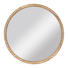 a round mirror with an intricate gold frame