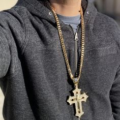 Men's huge iced cross pendant hip hop chain. 30" x 8mm cuban chain with a lobster lock. 18k gold plated finish over an alloy core. Big cross is approx 5" tall w/bale and 2.75" wide. Pendant iced with dazzling round-cut stones. Sturdy well made pendant has a caged back. Solid neck piece has good weight at 173 grams. We ship fast, within one bus. day of payment. 100% FREE SHIPPING in the USA. Order now! Luxury Large Cross Pendant Necklace, Luxury Iced Out Cross Jewelry, Streetwear Jewelry: Cross Pendant Chain, Streetwear Jewelry With Cross Pendant Chain, Streetwear Cross Pendant Chain Jewelry, Gold Iced Out Cross Pendant Necklace, First Bus, Big Cross, Hip Hop Chains