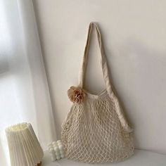 White Flower-shaped Shoulder Bag For Shopping, White Flower Shoulder Bag For Shopping, Flower Shaped Bag With Adjustable Strap For Summer, Summer Flower-shaped Bag With Adjustable Strap, Flower-shaped Summer Bags For Daily Use, Flower Shaped Summer Bag For Daily Use, White Flower-shaped Shoulder Bag For Beach, White Flower-shaped Bag For Vacation, White Flower Shaped Shoulder Bag For Travel