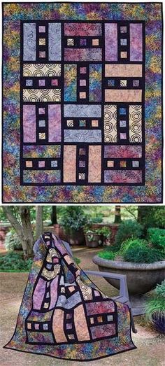 the quilt is made with different colors and patterns