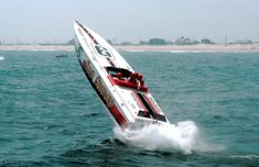 a boat is in the water with it's front end sticking out from the water