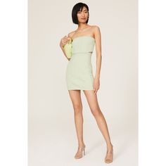 Green knit (74% Cotton, 25% Nylon, 1% Spandex). Sheath. Strapless. Sleeveless. Back zipper closure. 25" from bust to hemline. Imported. Fitted Strapless Mini Dress Lined, Spring Fitted Lined Bodycon Dress, Fitted Mini Dress With Straight Neckline For Spring, Fitted Knee-length Strapless Dress With Lining, Strapless Bodycon Mini Dress Lined, Spring Bodycon Dress With Fitted Bodice And Straight Neckline, Spring Sleeveless Bodycon Dress With Fitted Bodice, Fitted Strapless Dress With Straight Neckline And Lining, Fitted Green Mini Dress With Back Zipper