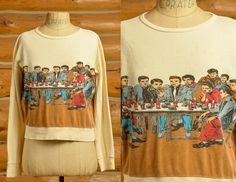 "1970s Guy Peellaert Elvis Last Supper Pop Art Long Sleeve T Shirt Incredible Guy Peellaert tee. Cotton rayon blend. A few light tea colored stains on front. Marked as Large. Please refer to measurements. Measurements shoulders: 19.5\" chest: 42\" length: 20\" sleeve: 22\"" Vintage Screen Print Tops For Fall, Vintage Screen Printed Tops For Fall, Nostalgic Crew Neck Top With Vintage Print, Vintage Print Crew Neck Top, Crew Neck Top With Vintage Print, Dashiki Dress, High Neck Sweater, Last Supper, Purple Velvet