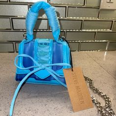 New W/ Tags Chain Detachable Mini Bag Trendy Blue Shoulder Bag For Gift, Blue Mobile Phone Bag For Fashion Accessory, Trendy Light Blue Bag For Gift, Trendy Turquoise Tote Bag, Trendy Turquoise Rectangular Shoulder Bag, Trendy Rectangular Turquoise Shoulder Bag, Blue Rectangular Bag With Chain Strap, Blue Tote Shoulder Bag With Chain Strap, Blue Clutch Bag With Chain Strap