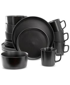 black dinnerware set with cups and saucers on the side, all in different sizes