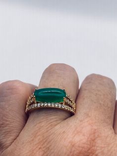 "Vintage green nephrite jade  bronze ring, gold rhodium does not tarnish Sizes 6, 7, 8 or 9  All rings are shipped in a nice gift box.   Check out our over a THOUSAND great reviews Engraving is $4 per letter and is not always perfect depending on the piece. It can take a few days if the jeweler is busy. This is payable to Paypal Judithsltd@gmail.com This is \"fun jade\" Color enhanced stone. Vintage 1970's re finished." Elegant Gold Jade Ring, Elegant Jade Open Ring, Formal Jade Ring Jewelry, Green Open Ring For Formal Events, Green Open Ring For Formal Occasions, Formal Green Open Ring, Fine Jewelry Jade Ring As Gift, Fine Jewelry Gold Jade Rings, Gold Jade Rings In Fine Jewelry Style