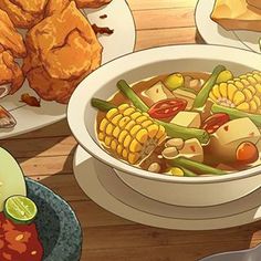 there is a bowl of soup with corn on the cob and other food items