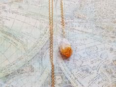 Raw Citrine Crystal Cluster Necklace, Orange Citrine Pendant Necklace, Gold Boho Bohemian Jewelry, Birthday Gift, Raw Stone Pendant Necklace This natural raw citrine cluster pendant necklace is suspended on a 14kt gold filled chain. Dress your jeans up with this stylish piece or wear long with your favorite sweater. This chic necklace goes great with just about anything. Whether a gift for yourself or your loved one, this necklace is sure to impress. This necklace also comes gift wrapped. Pendan Orange Birthstone Necklace As Gift, Orange Birthstone Necklace Gift, Bohemian Orange Necklace For Wedding, Bohemian Amber Citrine Necklaces, Orange Spiritual Necklace For Gift, Orange Bohemian Crystal Necklace For Gift, Bohemian Gold Teardrop Crystal Necklace, Bohemian Gold Necklaces With Birthstone, Bohemian Gold Necklace With Birthstone