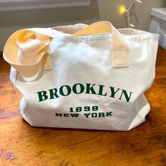 Brooklyn Canvas Tote Bag ~ Canvas With Evergreen Ink ‘Brooklyn 1898 New York Casual Green Bag With Letter Print, Green Canvas Bag With Letter Print For Everyday, Green Bags With Letter Print For Daily Use, Green Shoulder Bag With Letter Print For Daily Use, Green Letter Print Shoulder Bag For Daily Use, Green Tote Bag With Letter Print, Green Letter Print Tote Bag, Retro Everyday Canvas Bag With Letter Print, Everyday Retro Canvas Bag With Letter Print