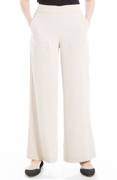 Flowy ankle trousers topped with an elastic waistband are a comfortable workwear essential that will elevate your professional style. 30" inseam, 25" leg opening; 11 1/2" front rise, 16 1/2" back rise (size Medium) Elastic waistband Front patch pockets 98% polyester, 2% spandex Machine wash, line dry Imported Model stats: 5'10", 32" bust, 25" waist, 36" hip. Model is wearing size M. Comfortable Workwear, Ankle Trousers, Workwear Essentials, Professional Style, Slim Trousers, Professional Fashion, Max Studio, Wide Leg Trousers, Work Wear