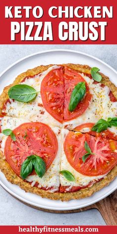 the keto chicken pizza crust is topped with tomatoes and basil