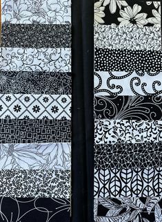 two pieces of black and white paper with designs on them