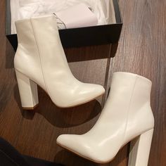 All White Brand New Never Worn Size 7 White Comes With Box Pleather Trendy White Faux Leather Heeled Boots, White Faux Leather Heeled Boots With Round Toe, Chic White Closed Toe Heeled Boots, White Round Toe Booties For Party, White Round Toe Party Booties, White Faux Leather Square Toe Heeled Boots, White Faux Leather Heeled Boots With Square Toe, Trendy White Heeled Boots With Block Heel, Trendy White Square Toe Heeled Boots