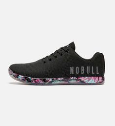 the nobull shoe is designed with black mesh and floral print on the outs