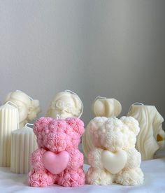 three teddy bears made out of fondant sitting next to each other on a table