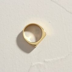 Our brand new 18K Gold Plated Level Ring. Beautifully flat, with a lovely precision feeling when worn, especially stacked with your other favourites, or just on her own, as a subtle addition to your outfit. When you're not wearing this piece, tuck it away in your very own Milou jewellery box provided. Stainless Steel, plated with 18K Gold Waterproof (Tarnish Resistant) Natural Linen Milou Jewellery Box Included For ring sizing, please see our Size Guide for details FREE (WORLDWIDE) SHIPPING Minimalist Gold Plated Dome Ring For Formal Events, Modern Gold Plated Signet Ring For Promise, Gold Initial Open Ring For Everyday, Gold Open Ring With Initial For Everyday Wear, Everyday Gold Plated Open Signet Ring, Gold Minimalist Ring For Formal Occasions, Minimalist Gold Plated Rings For Formal Occasions, Minimalist Gold Rings For Formal Occasions, Everyday Tarnish Resistant Signet Ring