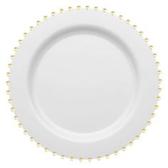 a white plate with gold beading on the rim and bottom, isolated against a white background