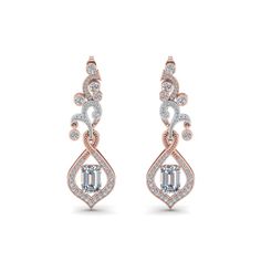 This Exclusive Diamond Drop Earring For Mom enthralls you with its magnificent beauty of the spectacular emerald cut diamond with your choice of color studded marvelously and highlighted by a series of tiny shimmering round shaped stones aligned beautifully in a gorgeous art deco design with a classic drop pattern offering you unmatched elegance and style.  Emerald cut stone of 1 ct. and round cut side stones of 1.21 ct. with Clarity VS2 and Color G in a prong, pave and bezel setting. Total Carat Weight:- 2.21 Total Number of Stones:- 114 The exclusive diamond drop earring can also be obtained in other precious metals and gemstones. Free Shipping within USA. One Year Manufacturing Warranty. Easy Returns and Financing Available. Purchase your jewelry at source price, liberated fro Luxury Women's Jewelry With Diamond Markers, Buying An Engagement Ring, Diamond Earring, Diamond Drop Earrings, Platinum Metal, Rose Gold Metal, Diamond Drops, Art Deco Diamond, Best Diamond