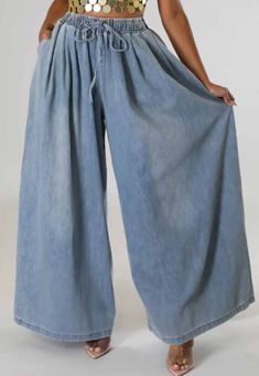 Oversized wide leg pants. Front pockets and single back pocket. Drawstring waist. Large can fit up to 3X. Generous sizing. Small- 31in inseam, 29in waist, 50in waist stretched Medium- 32in inseam, 33in waist, 50in stretched Large- 32in inseam, 37in waist, 53in waist stretched Solid Relaxed Fit Denim Bottoms, Solid Denim Bottoms With Relaxed Fit, Baggy Wide Leg Medium Wash Bottoms, Baggy Dark Wash Wide-leg Bottoms, Baggy Wide-leg Denim Bottoms, Solid Baggy Wide Leg Pants, Baggy Wide-leg Denim Pants, Baggy Denim Wide-leg Pants, Summer Full Length Flare Jeans With Pockets