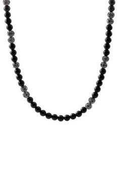 Sterling silver. Black onyx. Pavé black diamonds, total diamond weight: 6.84ct. Push clasp. Necklace, 6mm width. Imported. >Diamond Guide Luxury Formal Jewelry With Black Beads, Luxury Black Beads Jewelry For Formal Occasions, Elegant Black Necklace With Stones, Black Onyx Jewelry With 8mm Beads, Black Onyx 8mm Beads Jewelry, Black Onyx 8mm Bead Jewelry, Black Onyx Jewelry With Black Beads, Round Obsidian Jewelry With Black Beads, Luxury Black Jewelry With 8mm Beads