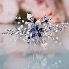 a bridal hair comb with blue and white crystals