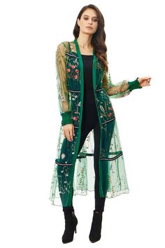 This luxurious, green embroidered duster is the epitome of spring renewal and summer vibrance. It features a lush, verdant fabric that serves as a canvas for a tapestry of vivid floral embroidery. The sheer sleeves and lower half of the duster are adorned with a garden of blooms, bringing an ethereal quality to the garment. With its open front and flowy silhouette, it's perfect for layering over a sleek black dress or a camisole and skinny jeans, creating a versatile look that transitions effort Sleek Black Dress, Sheer Sleeves, Floral Embroidery, A Garden, Front Open, Lush, Layering, Black Dress, Sleek