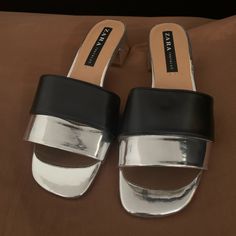 Zara Slip On Sandals Never Worn Out. Smoke/ Pet Free Bundle Deals For 2 Or More Items Only Chic Metallic Silver Sandals For Summer, Metallic Silver Sandals For Evening In Summer, Chic Metallic Silver Sandals For Spring, Trendy Silver Sandals For Formal Occasions, Metallic Silver Open Toe Sandals For Summer, Silver Block Heel Sandals For Night Out, Chic Metallic Silver Open Toe Sandals, Zara Silver Heels For Night Out, Chic Silver Zara Heels