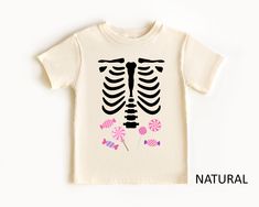 Skeleton Candy T-Shirt, Halloween X-ray Shirt, Trick Or Treat Tee, Official Candy Tester Outfit, Halloween Candy Clothing, Happy Halloween Gift, Halloween Sweet Shirt, Spooky Toddler Shirt, Scary Halloween Gift *HOW TO ORDER: 1. Please, Check and Review all Photos and Size Chart 2. Choose Your Color and Size 3. Choose Your Quantity as much as you want. 4. Click "Add to Cart". For multiple items go back to the listing and repeat the steps. *QUALITY: The Regular colors are 100% cotton. Heather colors are cotton/poly blend. * PROCESSING & SHIPPING: Processing is 1-2 days. First Class Shipping is 2-5 business days (after processing time). You can upgrade your shipping at the checkout to UPS GROUND (2-4 Days) and UPS-2 Business Days . *CARE INSTRUCTION: Wash item inside out in cold water, do no Unisex Halloween T-shirt, Halloween Playful Short Sleeve T-shirt, Playful Short Sleeve T-shirt For Halloween, Halloween Fun Skull Print T-shirt, Unisex Short Sleeve Halloween T-shirt, Fun Short Sleeve T-shirt With Skull Print, Unisex Short Sleeve Tops For Halloween, Candy Clothes, Funny Toddler