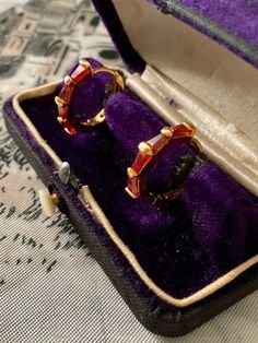 Magnificent vintage earrings in gold-plated and baguette-cut red stones. . elegant shape, superb design, set with garnet red color stone, in very good condition. box not included. Classic Evening Ruby Jewelry, Elegant Red Hoop Earrings For Formal Occasions, Vintage Ruby Jewelry For Parties, Vintage Ruby Evening Jewelry, Vintage Gold-plated Hoop Earrings As A Gift, Vintage Gold-plated Hoop Earrings For Gift, Vintage Gold Plated Hoop Earrings As Gift, Vintage Gemstone Earrings For Formal Occasions, Red Hoop Jewelry For Formal Occasions