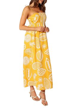 A bright tropical pattern puts a sunny spin on a maxi dress that's a breath of fresh air for your warm-weather wardrobe. Hidden back-zip closure Square neck Adjustable tie straps Lined 95% cotton, 5% linen Hand wash, line dry Imported Yellow Floral Print Vacation Dress, Tropical Maxi Dress For Spring, Tropical Style Spring Maxi Dress, Yellow Summer Maxi Dress For Vacation, Tropical Maxi Sundress For Vacation, Yellow Sundress For Vacation, Tropical Maxi Sundress For Day Out, Maxi Length Tropical Print Sundress, Yellow Maxi Dress For Beach Season